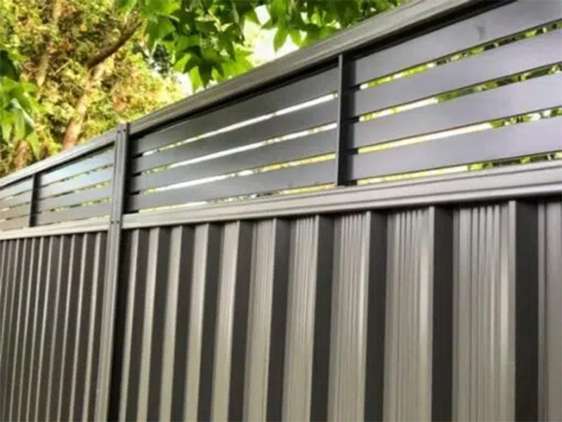 Steel privacy fence installation in British Columbia